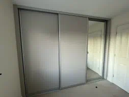3 plain panel doors with an addition hidden mirror door (showing hidden door), fitted in Ingleby Barwick